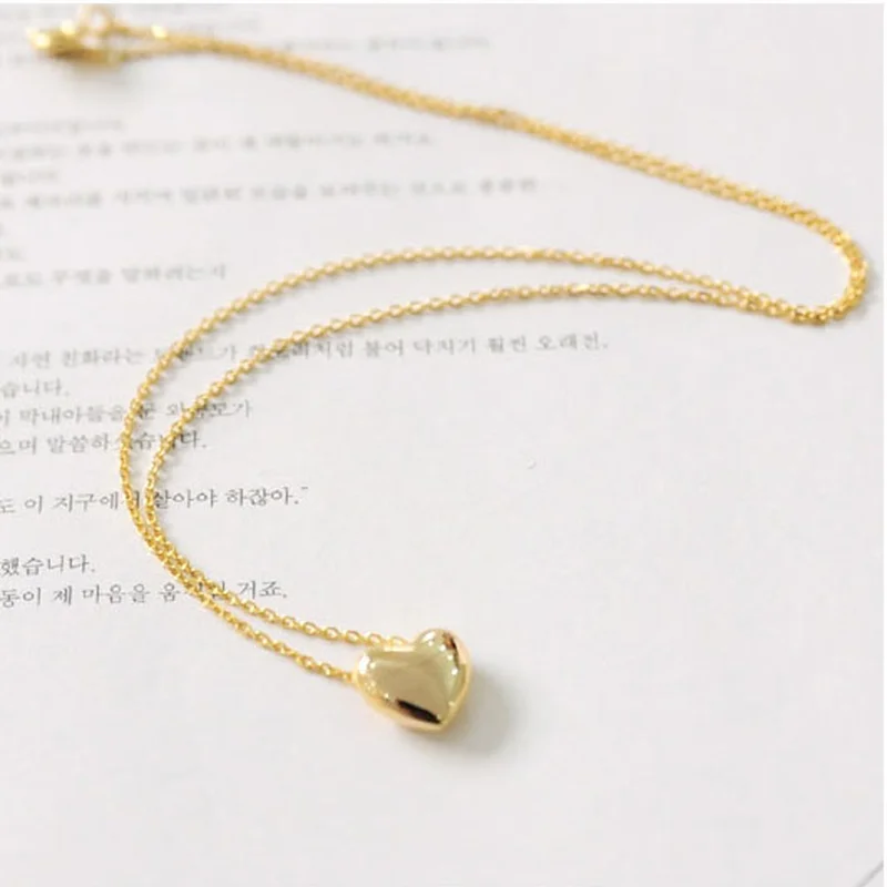 Нежное женское простое гладкое маленькое сердце розовое золото покрытое