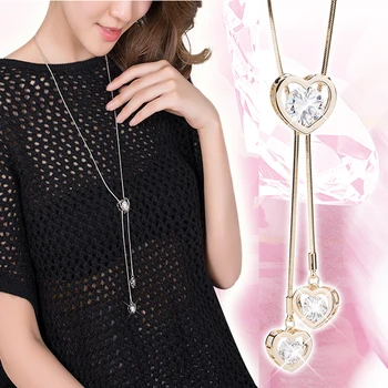 

Korean temperament love sweater chain female long peach heart crystal zircon initial necklace autumn and winter wild pendant