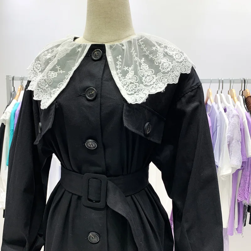 Южная Корея Dongdaemun весенняя одежда стиль кружева соединение Питер Пэн воротник сплошной цвет карман свободный крой пальто Талия Huggin
