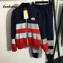 

luxury high quality letter print stripe stand collar long sleeve zipper coat + elastic high waist trousers fashion women's suit
