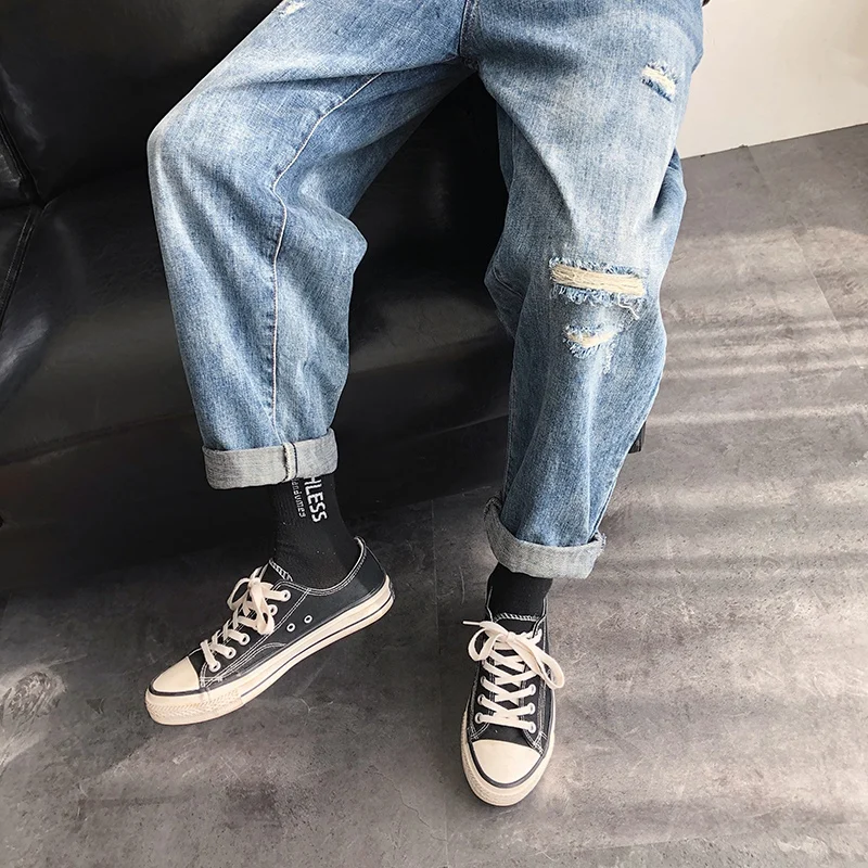 

Spring and autumn men's loose pants ripped jeans pants denim casual pants