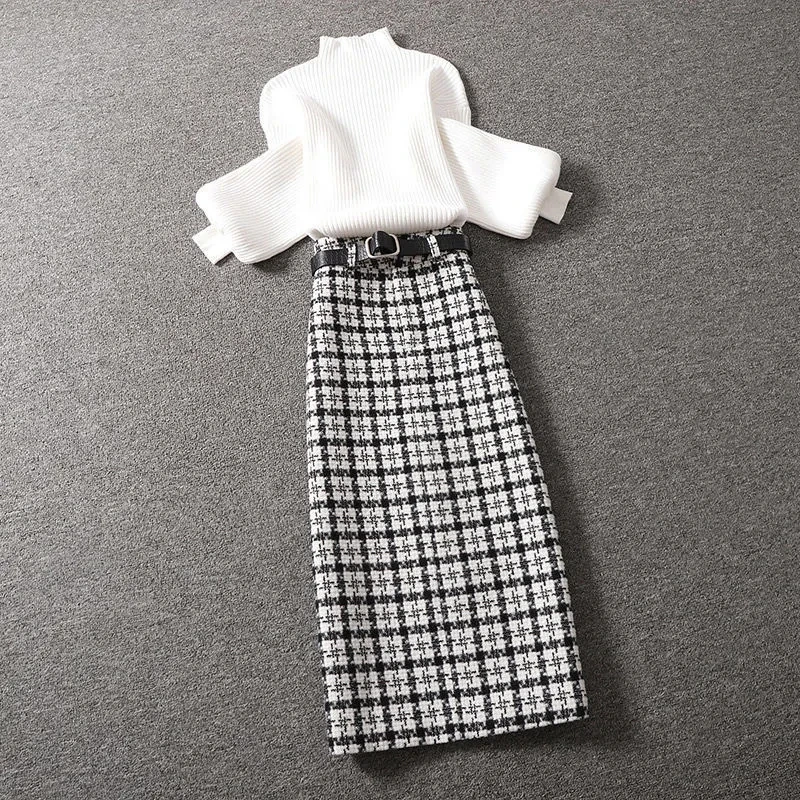 Mid-length skirt suit women 2021 autumn and winter new fashion lantern sleeve sweater houndstooth bag hip two-piece |