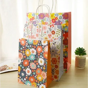 

30pcs Storage paper bag Floral gift sun flower kraft tote bag Stationery storage wholesale 21*15*8CM