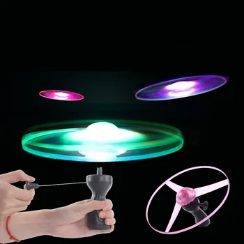 

Funny Spinning Flyer Luminous Flying UFO LED Light Handle Flash Flying Toys for Kids Outdoor Game Color Random For Children Gift