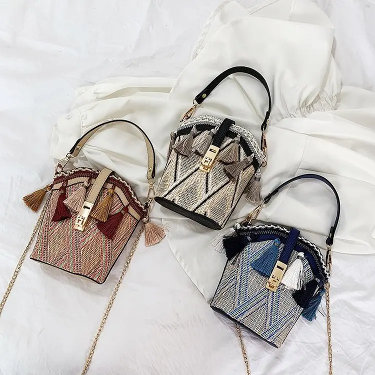 

Southeast Asia Shell Bucket Bag Tassels Straw Beach Bag Women's Crossbody Bag Hand Chain Small Bag Fashion