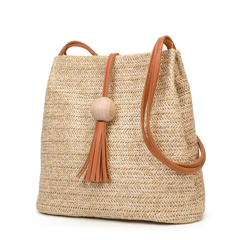 

South Korea Official Website Celebrity Style Bucket Bag Shoulder Straw Bag INS Summer New Style Wooden Ball Tassels Handbag