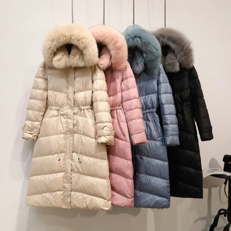 

2019 winter new double fox fur collar down jacket female long section thick hooded Slim white duck down jacket