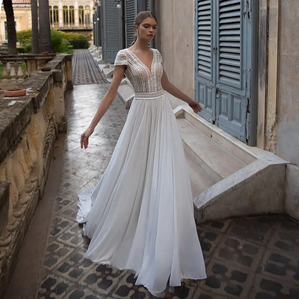 

Chic Boho Wedding Dresses Illusion V Neck Backless Appliqued Bow Cut-Out Simple Chiffon Bridal Gowns Cap Sleeves Robe De Mariee