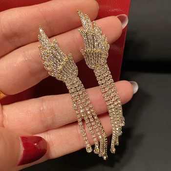 

trendy golden wing cz long tasssel earring for women