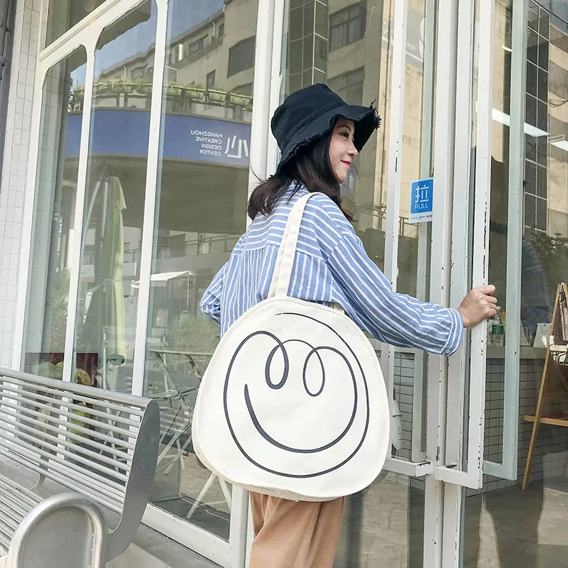 

INS Spoof Canvas Bag Women's Literature And Art Students Korean-style Shoulder Harajuku Ulzzang Simple Laziness-Style Smiley Clo