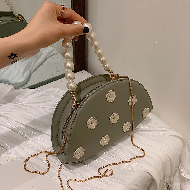 Korean version of female Pearl Tide handheld new single shoulder oblique satchel fashionable foreign gas semicircular bag