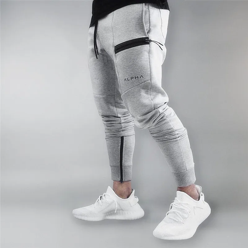 

2019 gyms New Clothing Man Pants Casual Skinny Trousers Bodybuilding Gyms Pants Men Joggers Elastic Sweatpants Four Color XXL