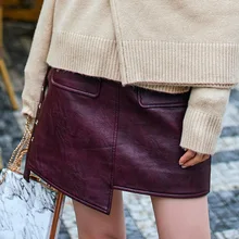 Модная новинка; оригинальная Женская юбка из искусственной кожи с пряжкой; однотонная короткая юбка из неровной кожи; 19B-a51