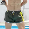 Mens Run Workout Fast Dry Fitness Beach Shorts  Swimwear Bathing Suit Solid Color Shorts with Adjustable Drawstring by AIMPACT ► Photo 3/6