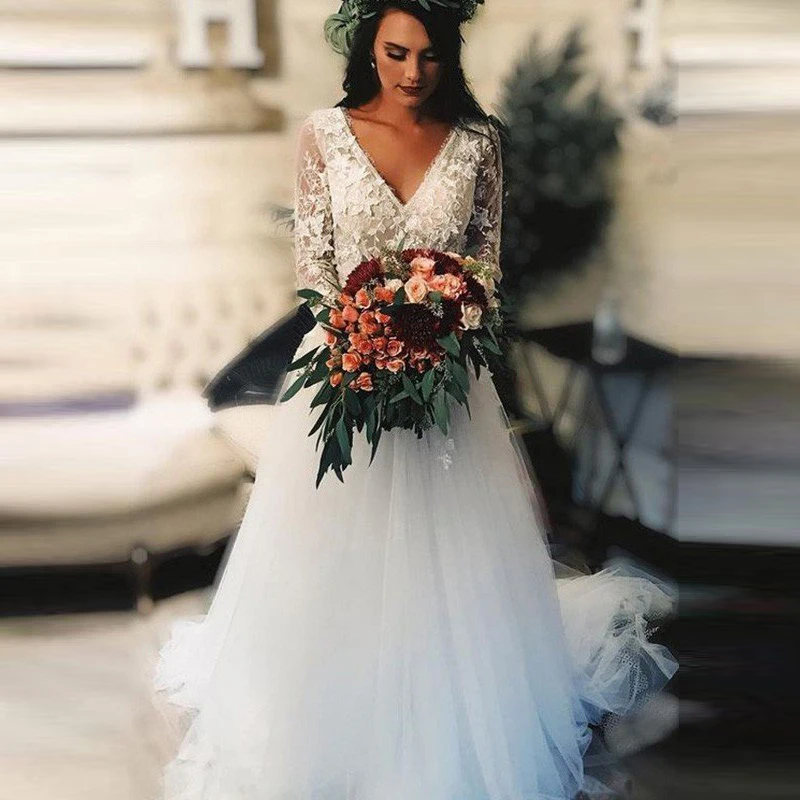 

Latest Arrival A Line Lace Long Sleeve Wedding Dresses for Bride Backless Boho Bridal Wedding Gowns Plunge V Neck Court Train