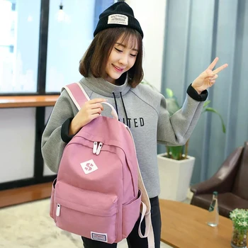 

Canvas backpack bag solid color Korean version of the college wind casual explosion student backpack new waterproof