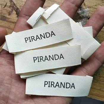 

1000PCS , 2 * 6 cm Custom name soft beige cotton cloth print label baby clothing