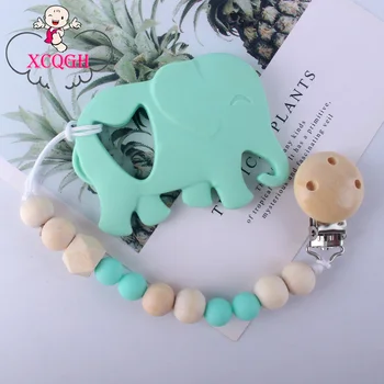 

XCQGH 2Pcs/set Wood Beads Pacifier Holder Chain Clip and Cartoon Elephant Teether Baby Shower Gift