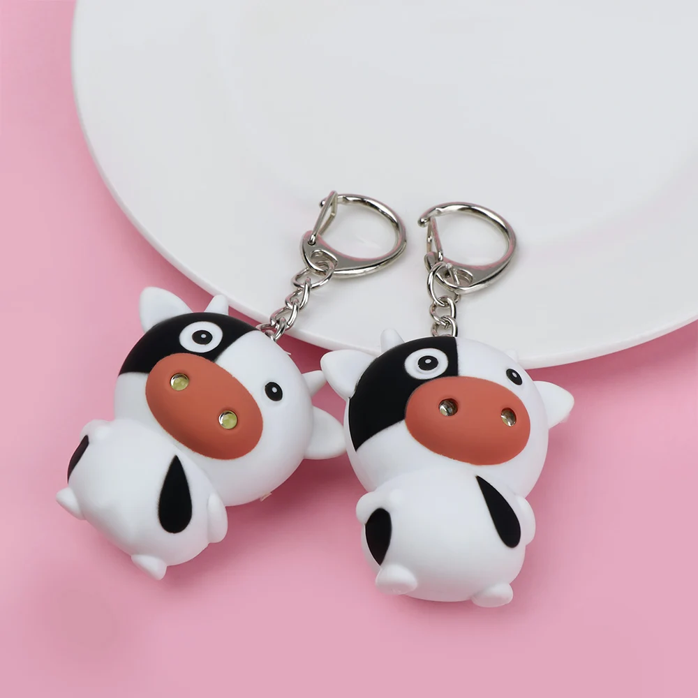 

Cute Cow LED Lights Keyring Glow Vocal Key Rings Cartoon Mini Flashlight Child Toys Women Girls Jewelry