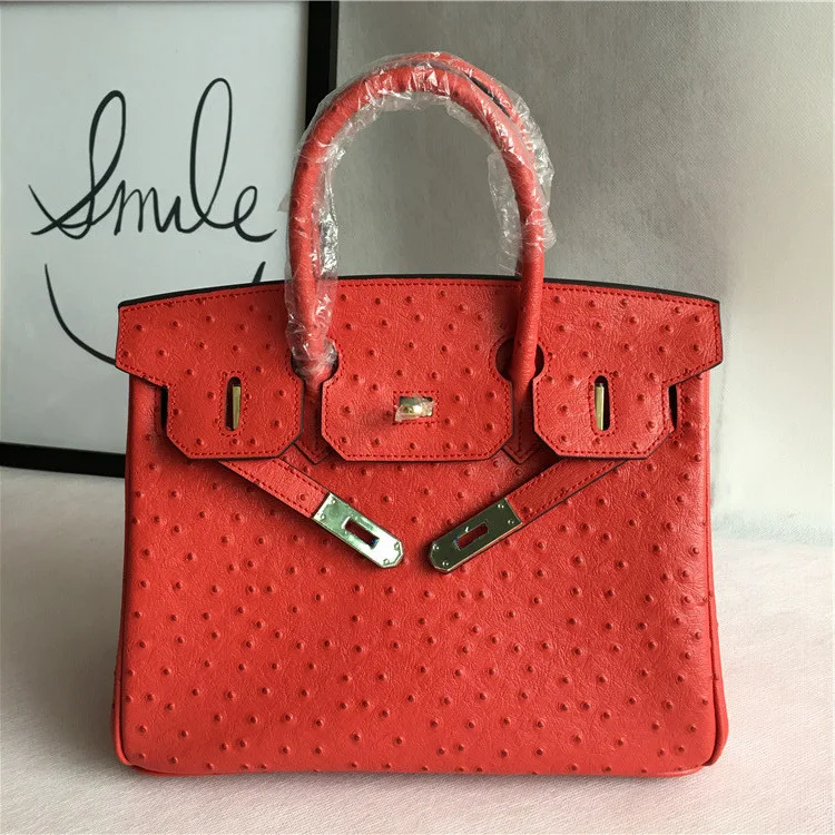 

Style Genuine Leather Female Ostrich Grain Big Red Hand Bill Of Lading Shoulder Oblique Satchel Marriage Bag