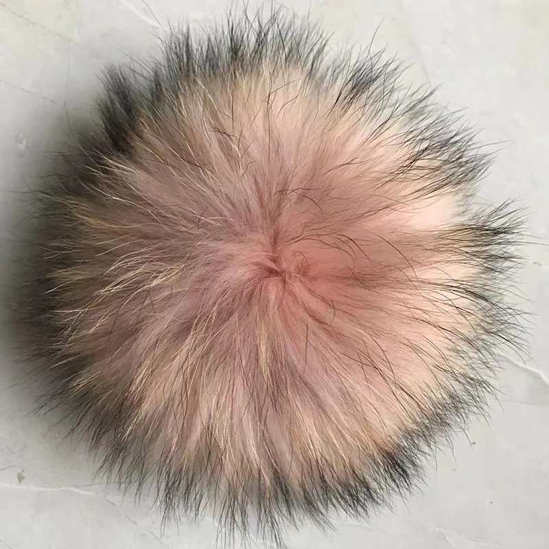 Fur pompoms for hats made of natural fox and raccoon fur