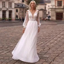 

Elegant Tulle Long Sleeve Floor Length Wedding Dress 2021 Sweep Train Appliques Custom Made Boat Neck A-Line Bridal Gowns
