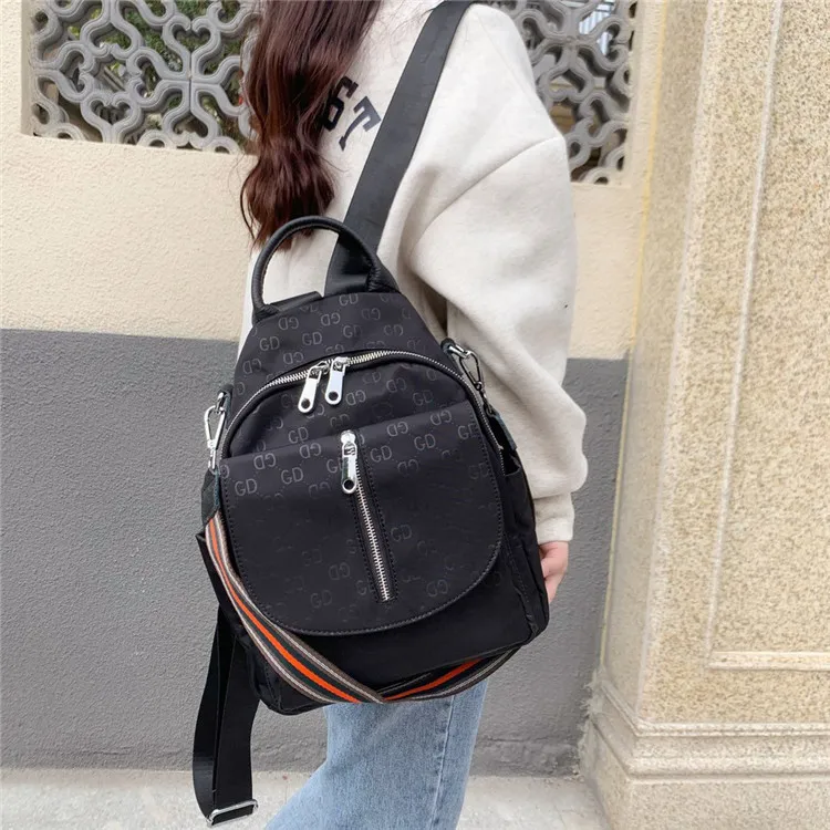 

2020 New Style Multi-functional Casual Backpack Korean-style Nylon Cloth with Shoulder Belt of Backpack GD Printed Letter