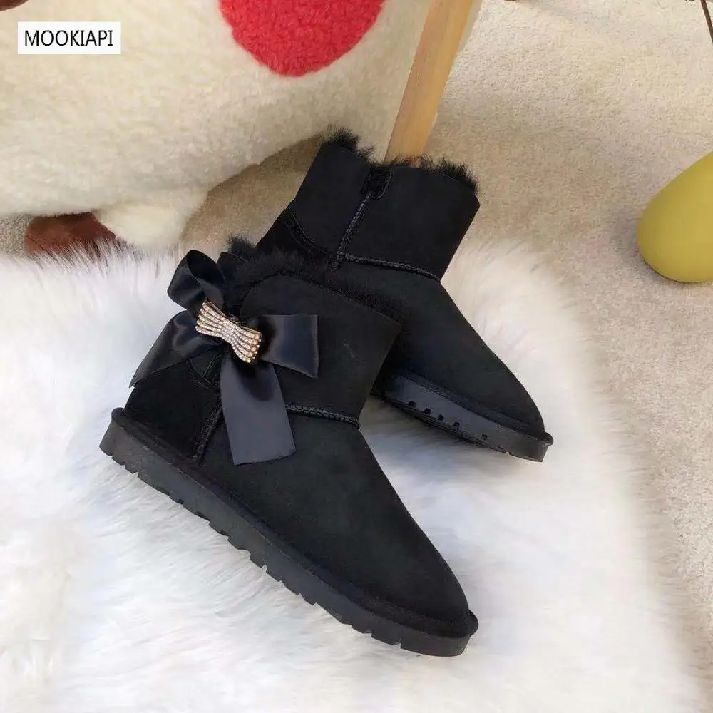 

2019 China's latest short tube buckle snow boots, real sheepskin, 100% natural wool, high quality women's shoes 4 colors, free
