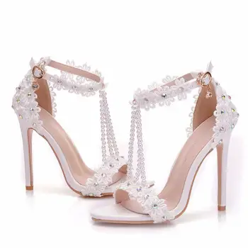

2019 summer new white word buckle shoes stiletto fish mouth Roman sandals white beaded high heel sandals female large size