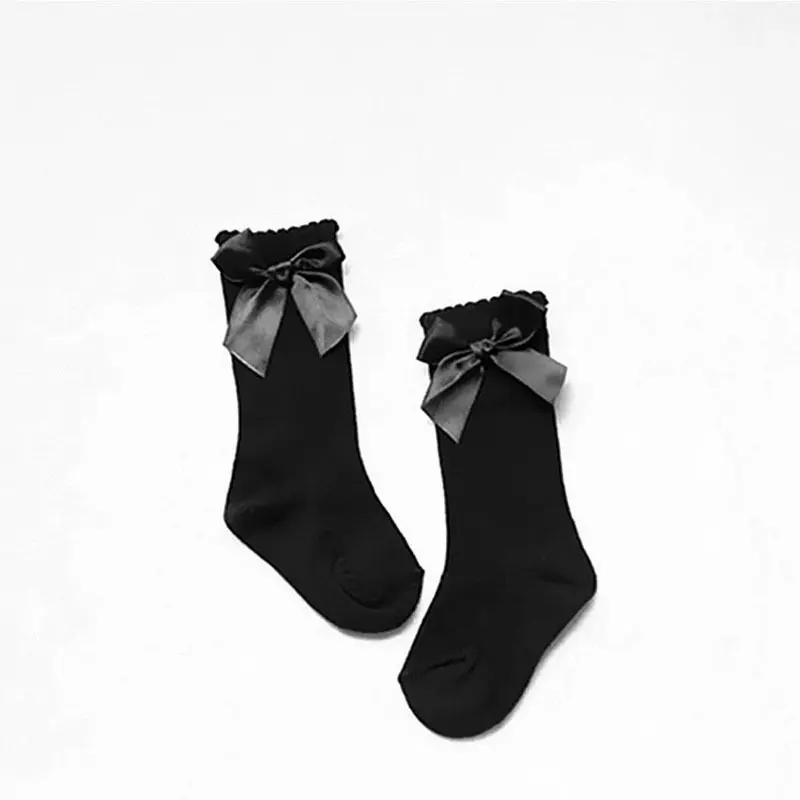 Носки для маленьких девочек милые Гольфы с бантиками для малышей длинные гетры для детей - Цвет: Black  0 to 2 Y
