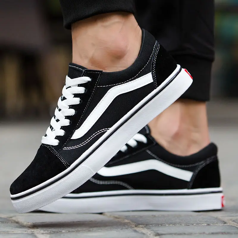 Zapatillas de deporte de marca de lujo para hombre y mujer, zapatos planos de lona informales Unisex, calzado deportivo negro para monopatín, 2021