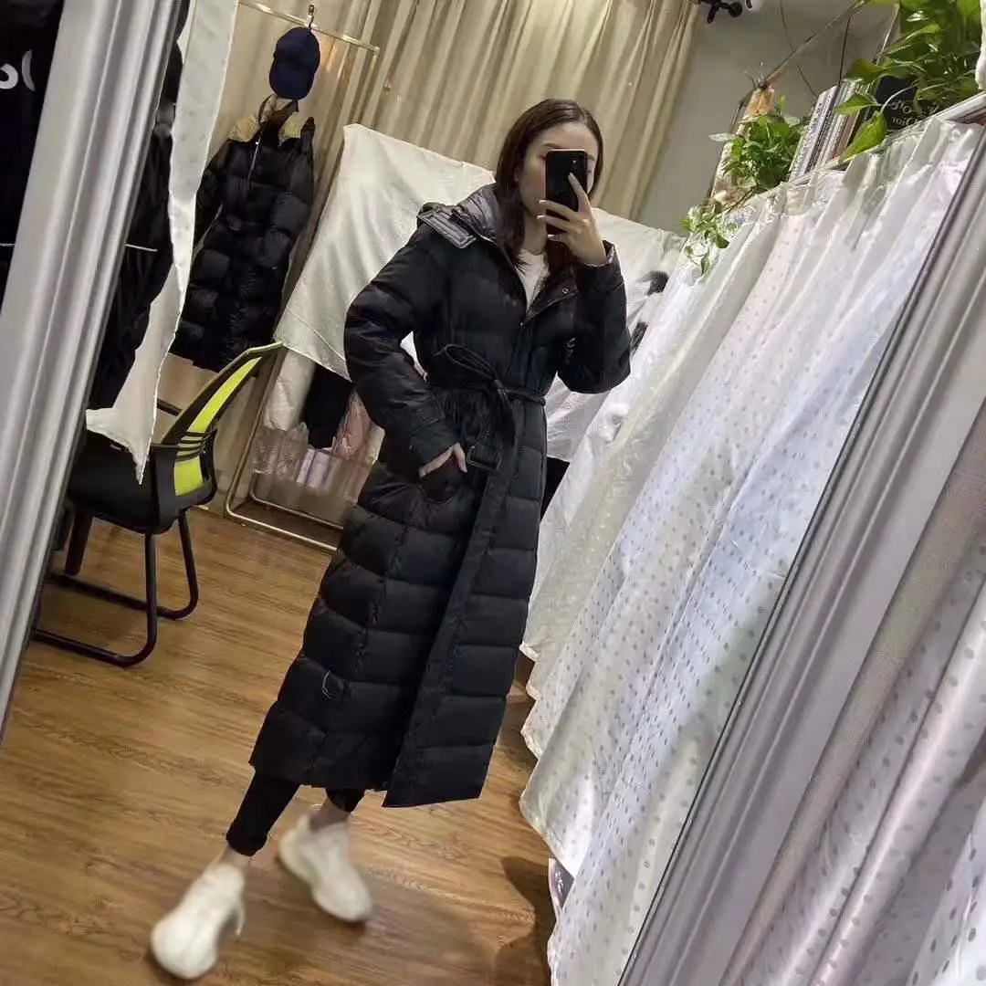 Женская длинная однотонная куртка, новинка, зимнее пальто с капюшоном, Корейская черная пуховая куртка для женщин, теплая парка, зимняя верхняя одежда
