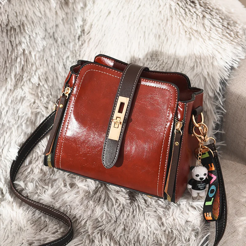 

2019 Spring And Summer Solid Color Bright Surface Shoulder Bag Cute Pendant Handbag Versatile Girl'S Shoulder Bag a Generation o