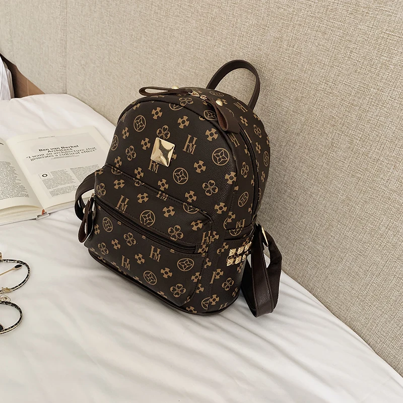 

European and American style Small Backpack Classic Flower Backpack Cute Rivet Leisure Backpack Designer Luxurious Female Bag