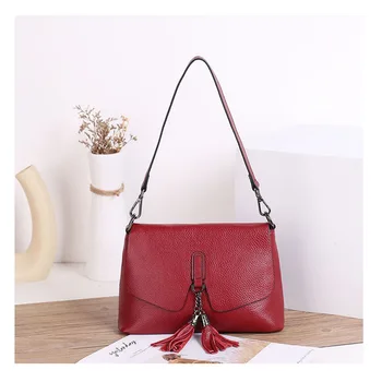 

2020 Solid Tassel Pendant Large Capacity Korean Shopping Travel Hand Bag women bagGenuine Leather Shoulder Bag Retro Crossbody