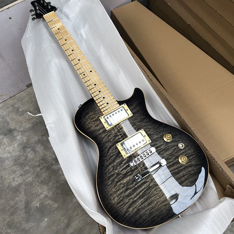 

2019 New Human electric guitar,Mahogany body With quilted maple Top and Guitar head shape designed by myself,free shipping