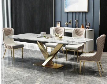 

Nordic marble luxury dining table and chair combination Post-modern minimalist Italian dining table stainless steel rectangular