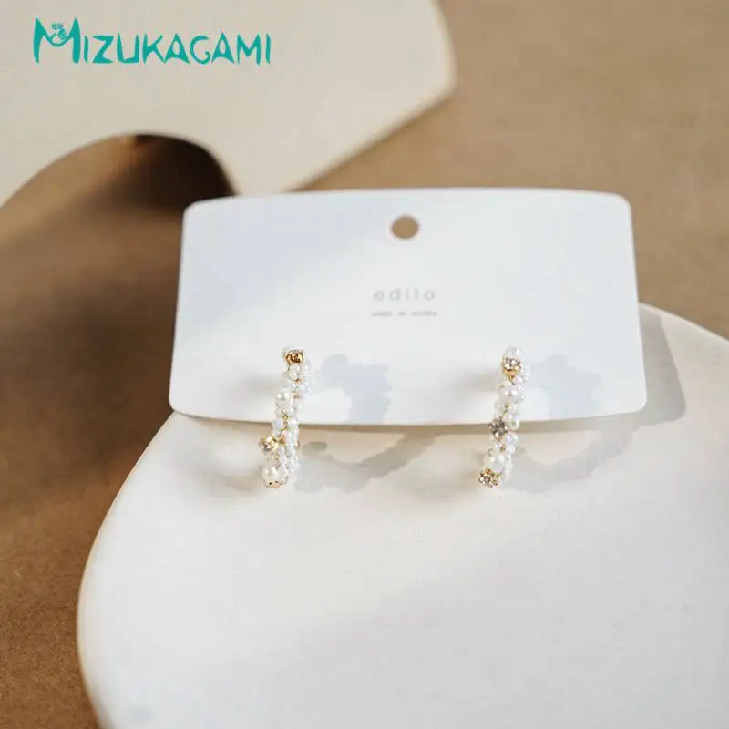 

A pair of Korea Dongdaemun Freshwater Pearl Handmade Earrings Wild Temperament Retro Flash Diamond S925 Silver Stud Earrings