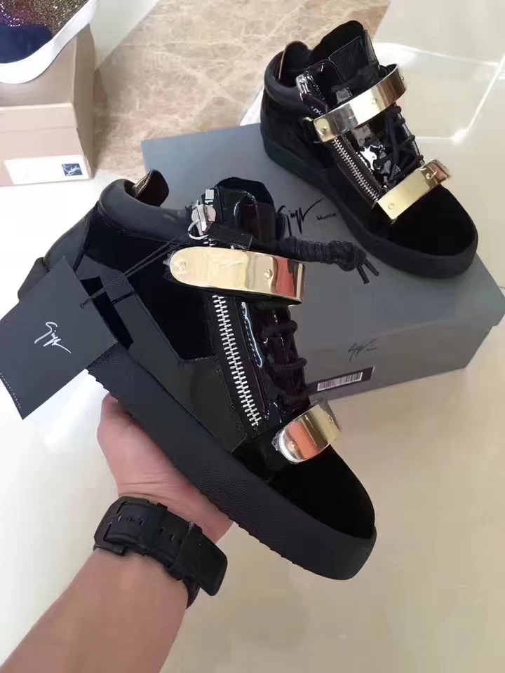 black and gold designer trainers