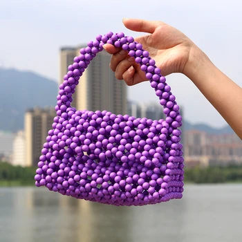 

Pearl bag women 2020 summer new minority dinner bag fashion Joker Pearl handbag hollow beach tide