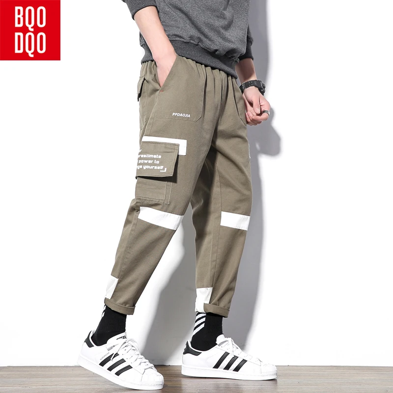 

BQODQO Letter Printed 3M Reflective Harem Joggers Pants Men Casual Cargo Pant Male Hip Hop Casual Spliced Streetwear Trousers