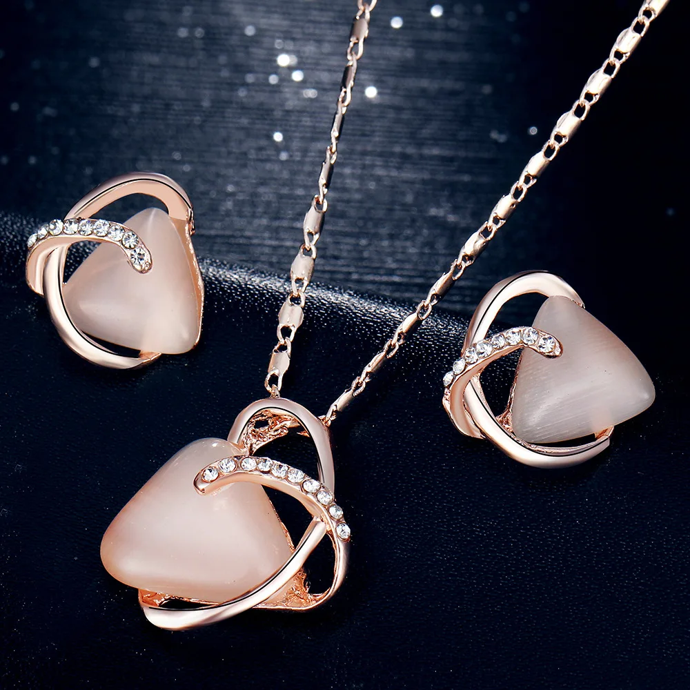 

Europe And America New Style Triangular Cat's Eye Stone Crystal Necklace Suit Necklace Ear Stud Earrings Three-piece Set Jewelry