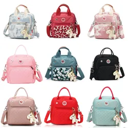 Bolsa de pañales colorida de lona de alto nivel para mamá, bolsas de pañales para bebé, mochila de maternidad, bolso de mano, bolsa de mensajero tres en uno