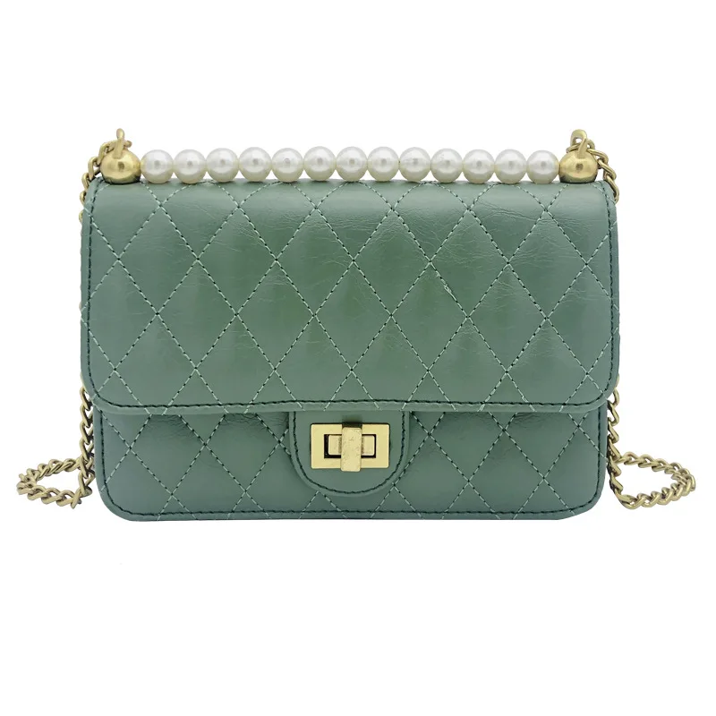

New Spring And Summer 2009 Fashion Baitie With One Shoulder And Diagonal Pearl Chain Ladies On The New Small Ladies Bag