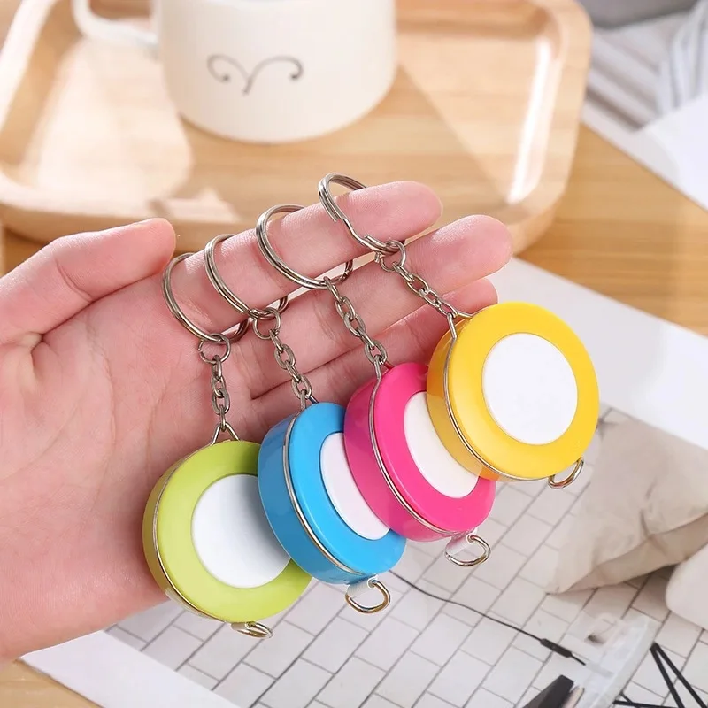Description Picture 2 of item1PCS 150cm/60" Tape Measures Portable Retractable Ruler Mini Candy Color keychain Children Ruler Centimeter Inch Roll Tape