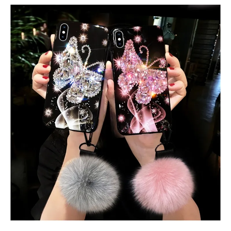 

Beautiful Bling Crystal Butterfly Fur Ball Pendant Hand Chain Case Cover For Iphone 12 Mini 11 Pro XS Max XR X 8 7 6 6S Plus SE