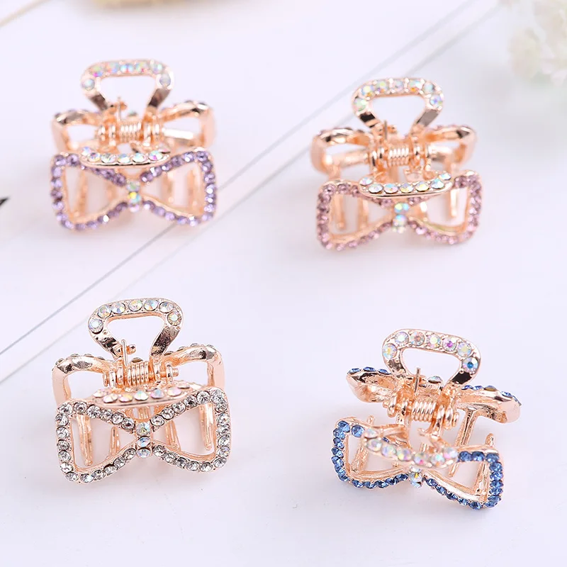 

Fashionable and simple color alloy rhinestone bow spring grip clip side clip unique temperament ball fixed clip A11