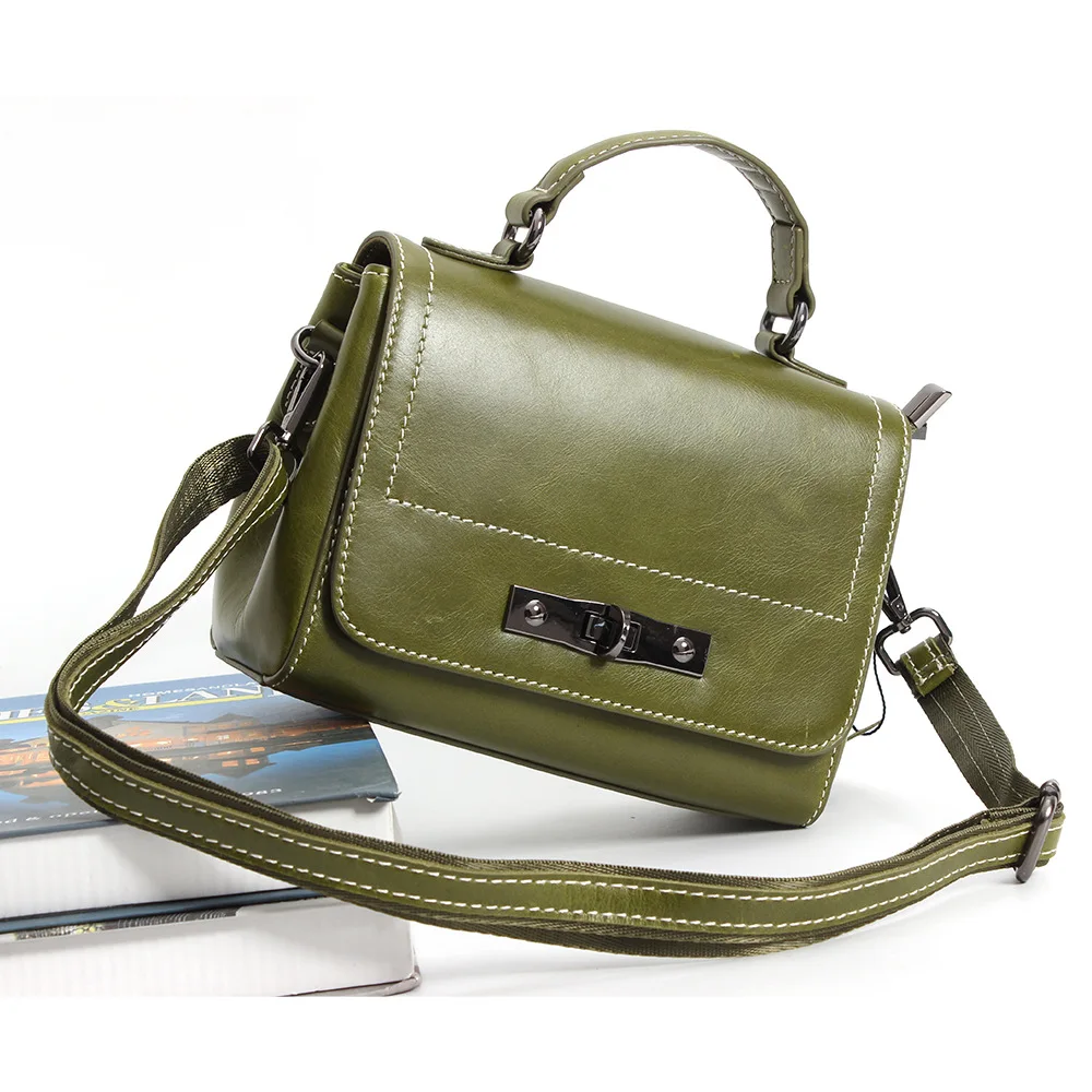 

2018 new leather lady's headdress cowhide lady's hand-held horizontal recreational single-shoulder wax pitot bag