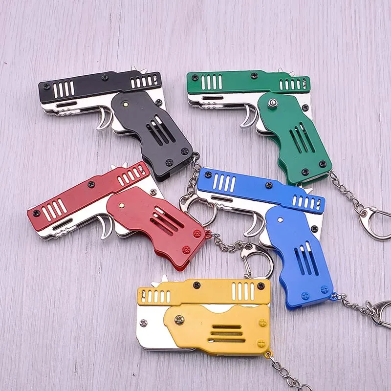 

Game CSGO Weapon Folding Gun Keychain Metal Simulation Gun Model Pendant Keyring Online Games Model Toys For Boys Birthday Gifts