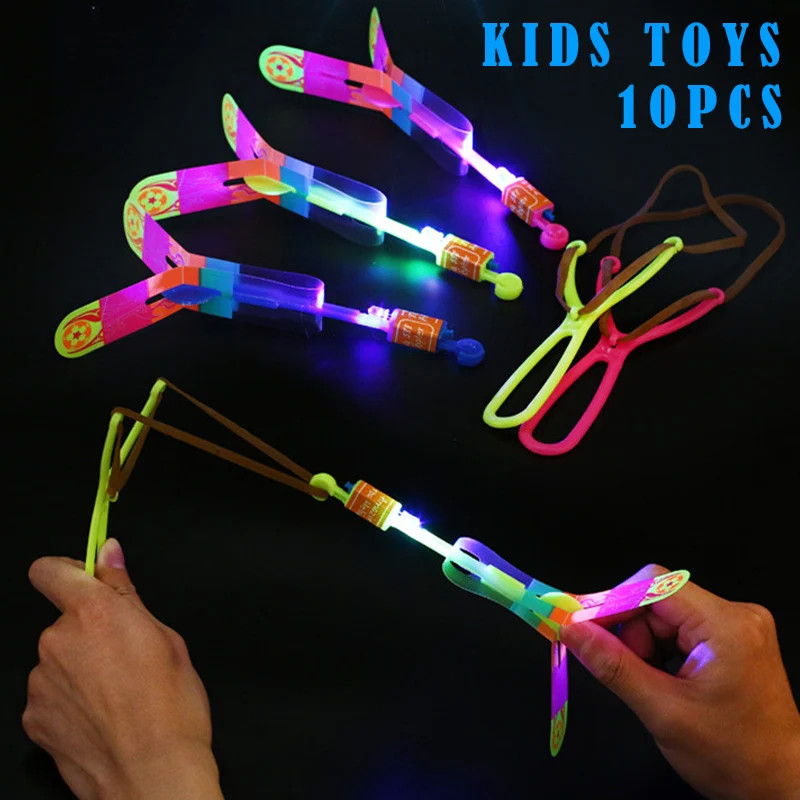

10 Pcs Amazing LED Light Arrow Rocket Kids Helicopter Flying Toys Outdoor Flashing Toy Fly Arrow Children'S Toys Xmas Gift FDX99
